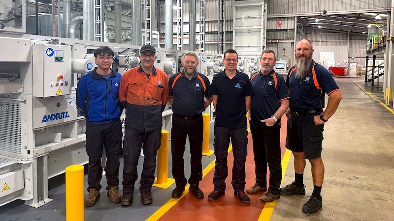 Sealy Australia and ANDRITZ teams in front of the 6-cylinder EXEL module © 2024 Andritz