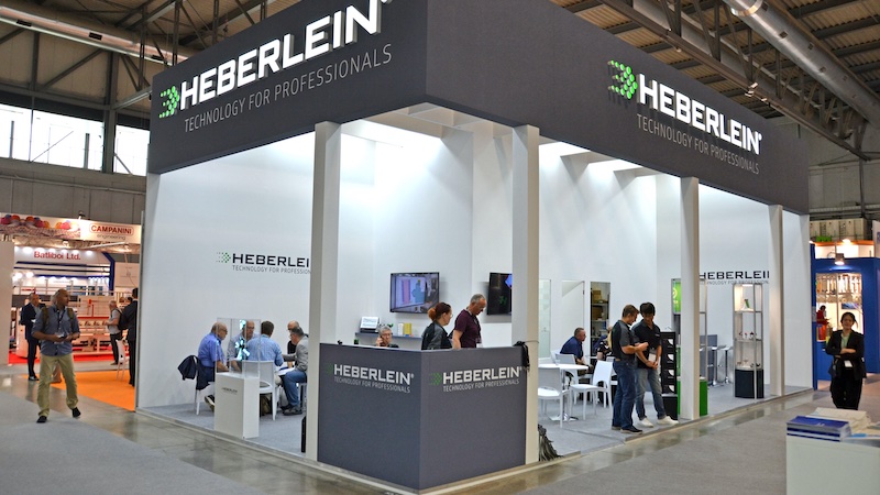 Heberlein booth at ITMA 2023  © 2024 TexData International