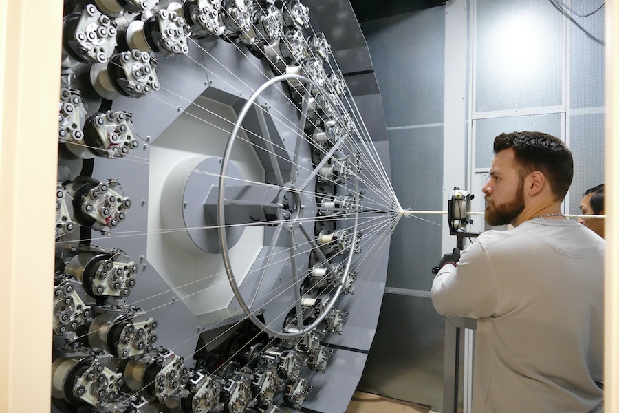 Technician at a braiding machine © 2025 Mayer & Cie. Technician at a braiding machine © 2025 Mayer & Cie.