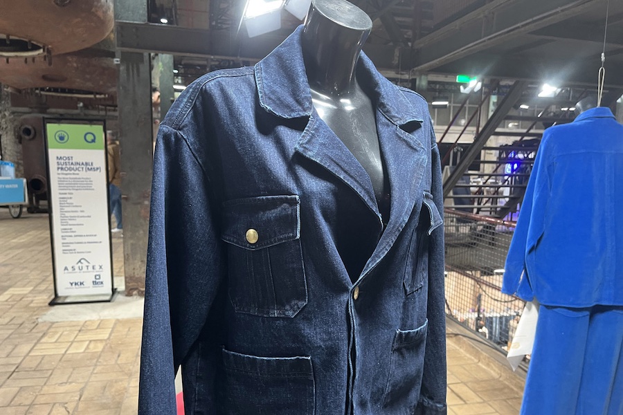 Naveena Denim 100% recycled cotton garment in the Kingpins Most Sustainable Product (MSP) display © 2025 Monforts Naveena Denim 100% recycled cotton garment in the Kingpins Most Sustainable Product (MSP) display © 2025 Monforts
