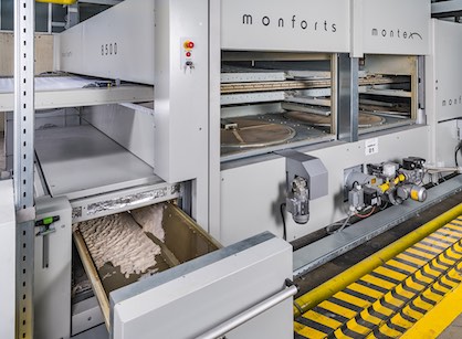 The ‘disc-o-clean’ unit on the new stenter carries out the automatic sieving and collection of dust from production (c) 2018 Monforts The ‘disc-o-clean’ unit on the new stenter carries out the automatic sieving and collection of dust from production (c) 2018 Monforts