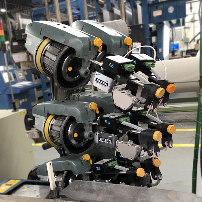Perfectly uniform weft tension with Eltex ACT-R on a rapier weaving machine. © 2026 TMAS