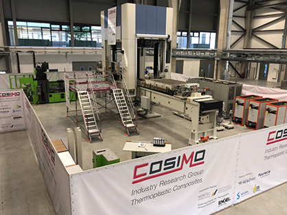 1000 t press with tool handling system complemented by different equipment for thermoplastic processing (c) 2018 ITA Augsburg 1000 t press with tool handling system complemented by different equipment for thermoplastic processing (c) 2018 ITA Augsburg