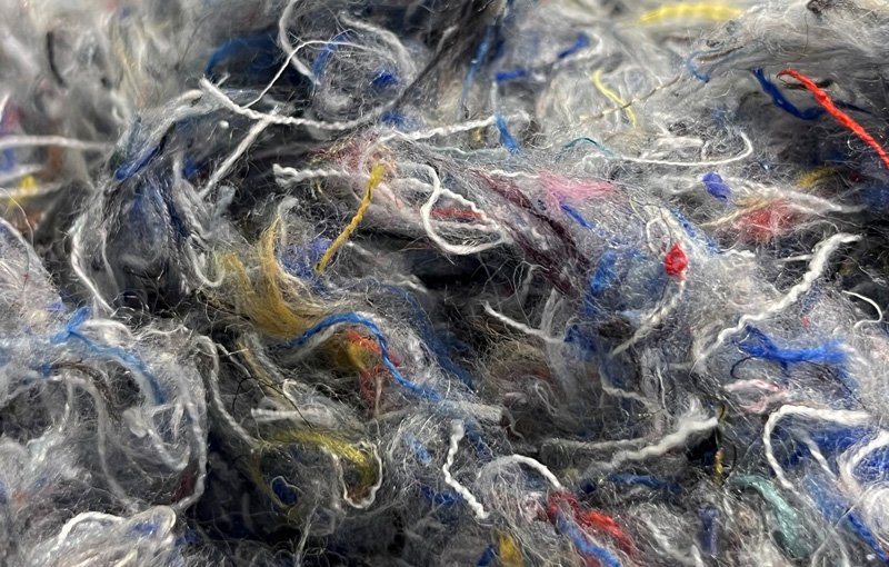 © Photo: Indorama Ventures / ALTEX | Torn fibers made from out of use Trevira CS fabrics